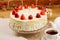 Delicious biscuit cake with fresh strawberries and biscuit cream