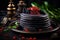 Delicious black crepes with luxurious red and black caviar on elegant intimate background