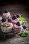 Delicious blackberry cupcake made of pink cream and fresh fruits