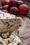 Delicious blue cheese on wooden rustic background