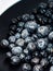 Delicious blueberries in black plate