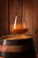 Delicious bourbon on a wooden barrel