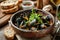 A delicious bowl of black mussels with white wine