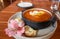 A delicious bowl of Peruvian sopa criolla and sourcream