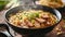 A delicious bowl of ramen with pork, scallions, and sesame seeds. The ramen is served in a rich and flavorful broth