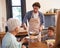 A delicious breakfast courtesy of Chef Dad. A cropped shot of a happy man serving his family a deliciously cooked