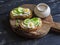 Delicious breakfast or snack - open sandwich with goat\'s cheese and cucumber and boiled quail eggs