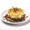 Delicious British Shepherd\\\'s Pie with Mashed Potatoes on a Plate.
