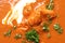 Delicious butter chicken as background, closeup.