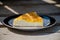 Delicious cake with apricot jam on a plate. Crostata with marmalade or peach jam filling. Homemadepie dessert with dandelion jam.