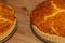 Delicious cheese quiches on wooden background