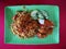 Delicious chicken biryani on a plate looks like a banana leaf