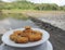 Delicious chicken nuggets on the edge of rice fields