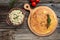 Delicious chicken pancake with chicken. Traditional Russian Shrovetide Maslenitsa festival meal on wooden background. top view