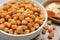 Delicious chickpeas on table, closeup. Hummus ingredient