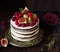 Delicious chocolate cake with figs and berries on a rustic background. Wedding Naked cake with fruits in rustic style.