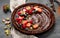 Delicious chocolate tart on gray background.