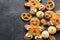 Delicious Christmas gingerbread men.Christmas baking ingredients and supplies on dark background.Postcard. Congratulation.Cooking