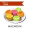 Delicious colorful macaroni from french cuisine on plate