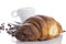 Delicious continental breakfast of coffee and croissants