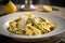 Delicious crab and asparagus pappardelle on white plate