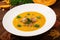 Delicious cream of pumpkin soup with meatballs made of turkey minced meat