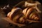 Delicious croissants with chocolate on wooden table, selective focus