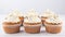 Delicious cupcakes with cream cheese frosting and cinnamon sprinkle, an irresistible treat to savor