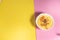 Delicious custard in yellow and pink background