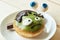 A delicious cute green doughnut on the plate