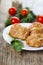 Delicious cutlets, tomatoes and parsley