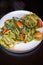 A delicious and delicious western food, seafood pasta with avocado green sauce