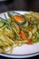 A delicious and delicious western food, seafood pasta with avocado green sauce