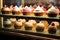 Delicious Delights Tempting Assortment of Cupcakes in a Bakery Window Display. created with Generative AI