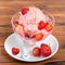 Delicious dessert strawberry pink vanilla ice cream scoops with