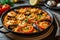 A delicious dish of paella filled with succulent shrimp, plump mussels, and vibrant tomatoes simmering in a pan, Dish of