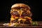 Delicious double-decker burger with melting cheddar cheese on black background