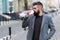 Delicious drink. Man bearded hipster drink coffee paper cup. Businessman well groomed enjoy coffee break outdoors urban