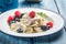 Delicious dumplings with fresh fruits and cream