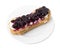 Delicious eclair with berry jam.