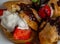 delicious eclairs with ice cream and strawberries, topped with chocolate glaze - the perfect dessert, macro photography