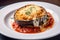 Delicious Eggplant Parmesan Dish with Melted Cheese and Golden Bread Crumbs