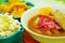 Delicious encebollado fish stew from Ecuador traditional food national dish closeup with popcorn