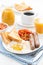 Delicious English breakfast with sausages, vertical