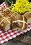 Delicious English style Happy Easter Hot Cross Buns - vertical