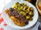 Delicious entrecote with a garnish of vegetables