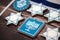 Delicious festive Hanukkah cookies for celebrating on a wooden background. Closeup.