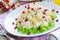 Delicious festive salad with chicken breast, corn, cheese, pineapple