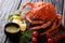 Delicious food: boiled spider crab with tomato, lemon and melted