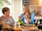 Delicious food made just the way you taught me, Mom. a mature woman and her elderly mother enjoying a meal together at